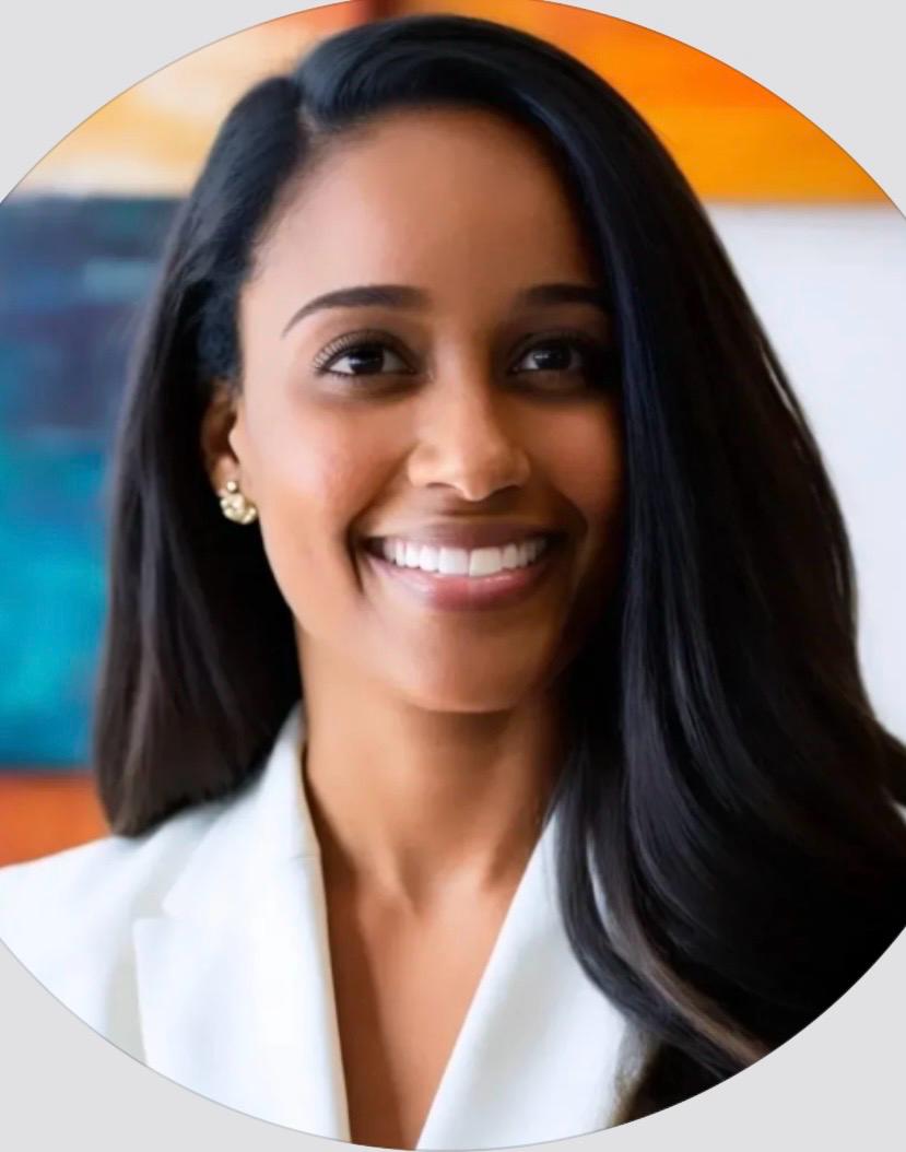 Xiomara "Xio" Martinez, Co-Founder and Counselor, smiling in a white blazer